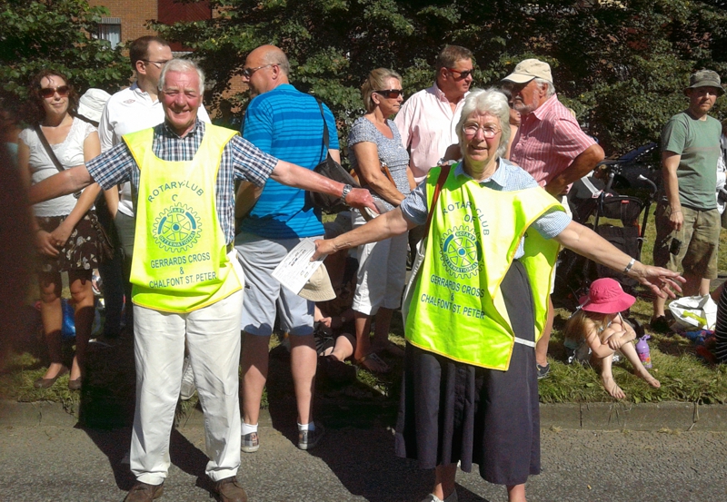 Rotarian Bill Collins and his wife Pat controlled traffic